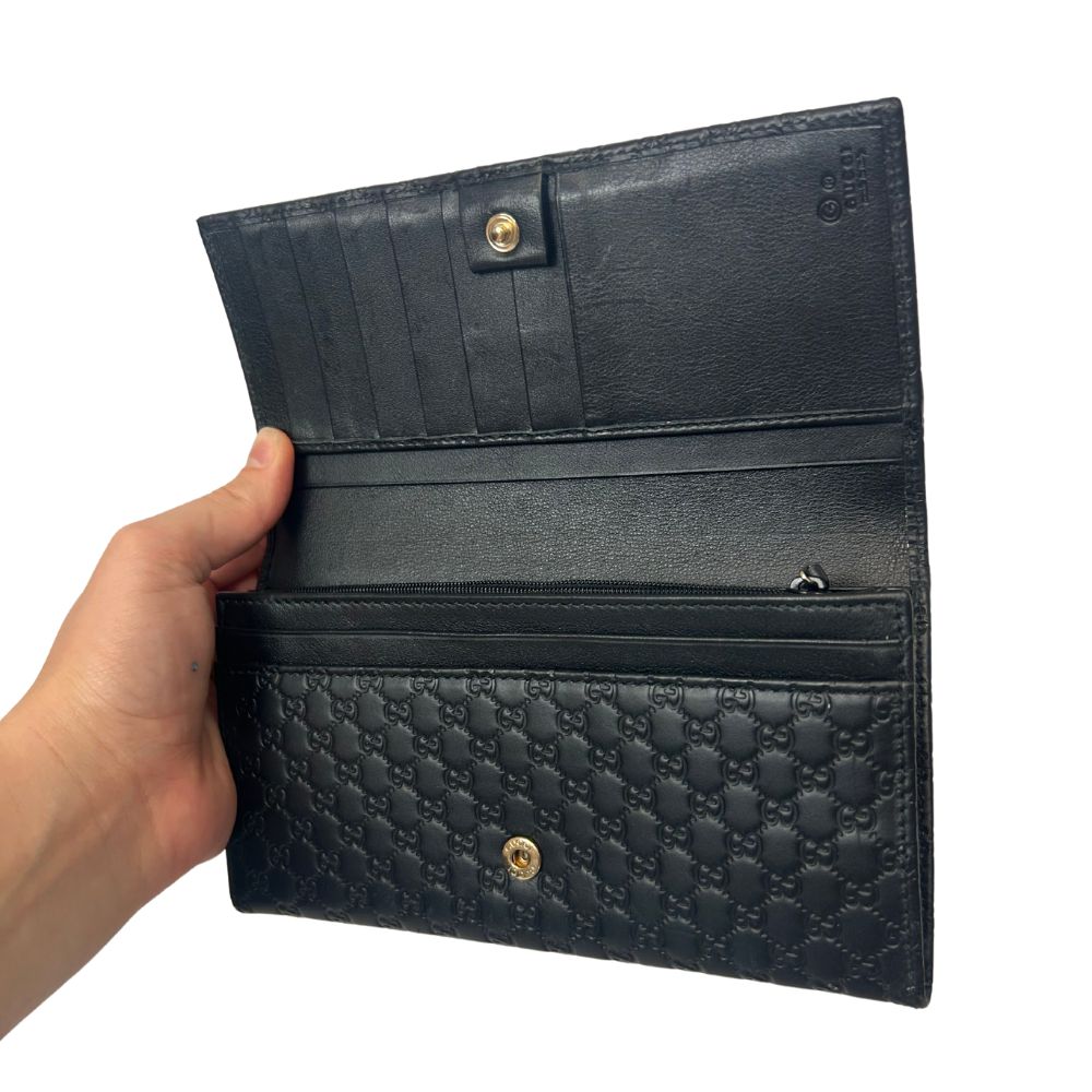 Gucci GG Microguccissima Continental Wallet – Black Leather Elegance