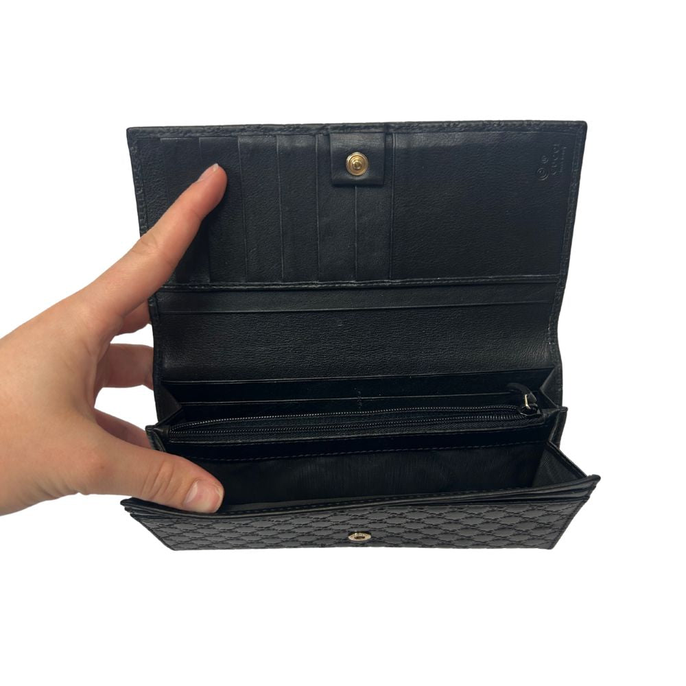 Gucci GG Microguccissima Continental Wallet – Black Leather Elegance