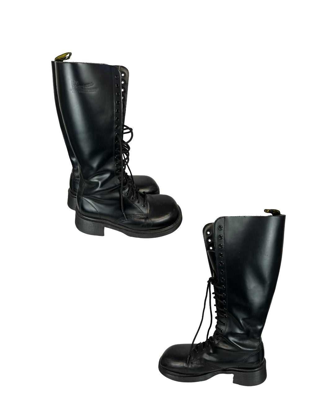 Side view of black leather knee-high platform lace up boots