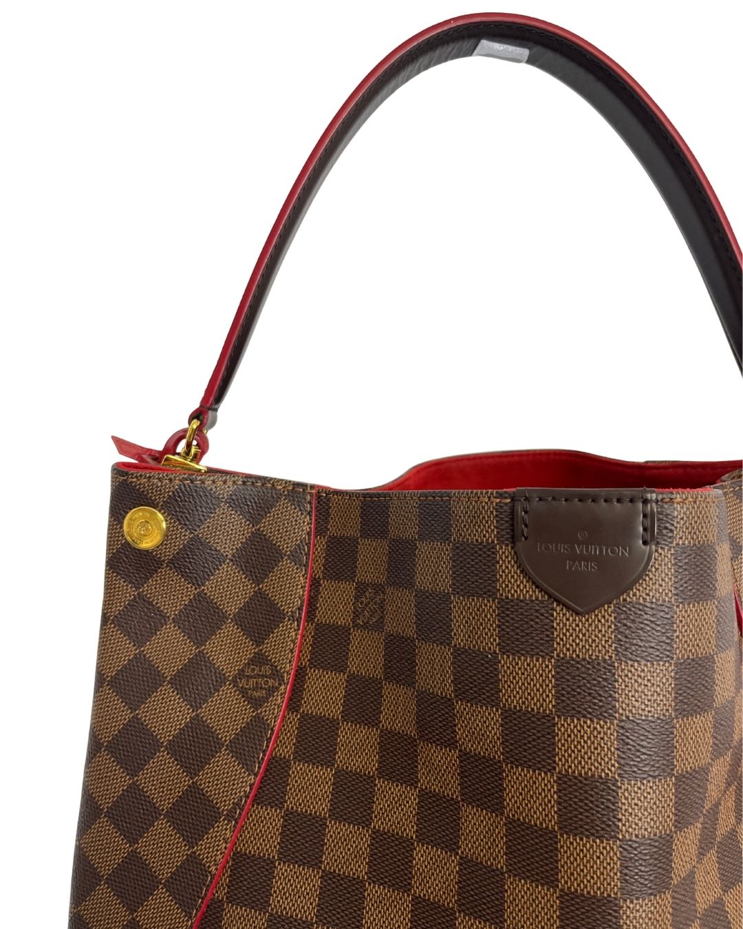 Close up view of brown leather Louis Vuitton tote bag