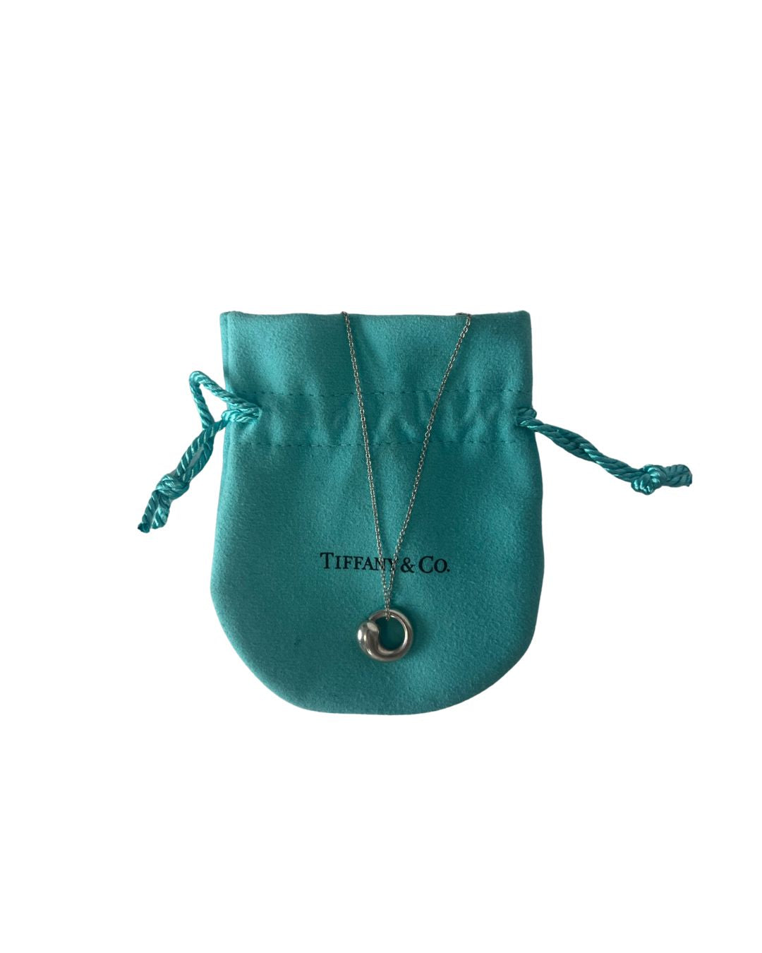 Necklace with blue pouch behind